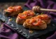 Pa amb tomàquet con sobrasada, servido fresco con aceite de oliva y albahaca