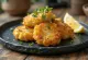 Bolinho de bacalhau sin gluten, buñuelos dorados de bacalao servidos
