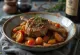 Ossobuco al tomillo en salsa con gremolata