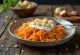Ensalada de zanahoria prebiótica servida con yogur, zanahoria rallada y perejil fresco