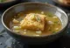 Caldillo de ajo servido con pan fresco
