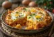 Parmigiana de berenjena empanada con salsa de tomate y quesos