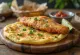 Bammy con pescado frito, pan de yuca con coco y pescado frito con lima