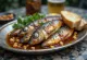 Sardinas a la brasa con toque ahumado servidas