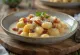 Ñoquis con bacon servidos